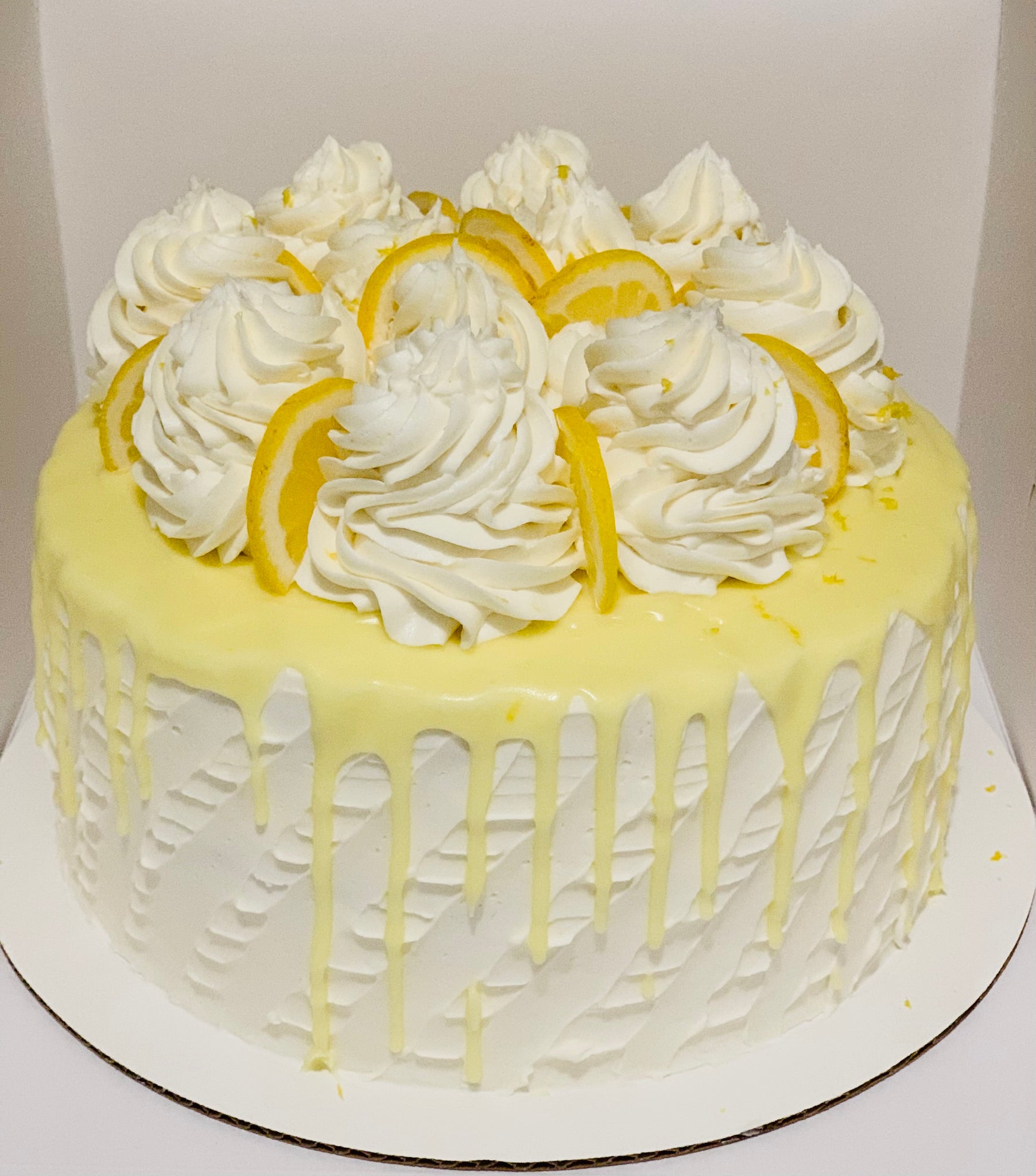Fun sunny drip cake to brighten your day! #yellow #cake #decoration  #yellowcakedecoration | Simple cake designs, Easy cake decorating, Drip  cakes